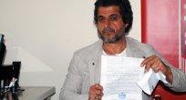 BABASININ MUHTARLIK YAPTIĞINI İSPAT EDEMEDİ
